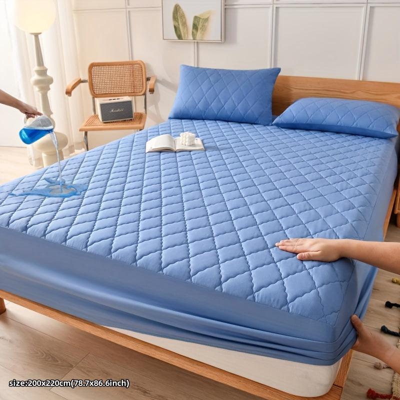 Waterproof mattress protector cover in mixed colors, ultra-soft quilting, and 100% polyester material.