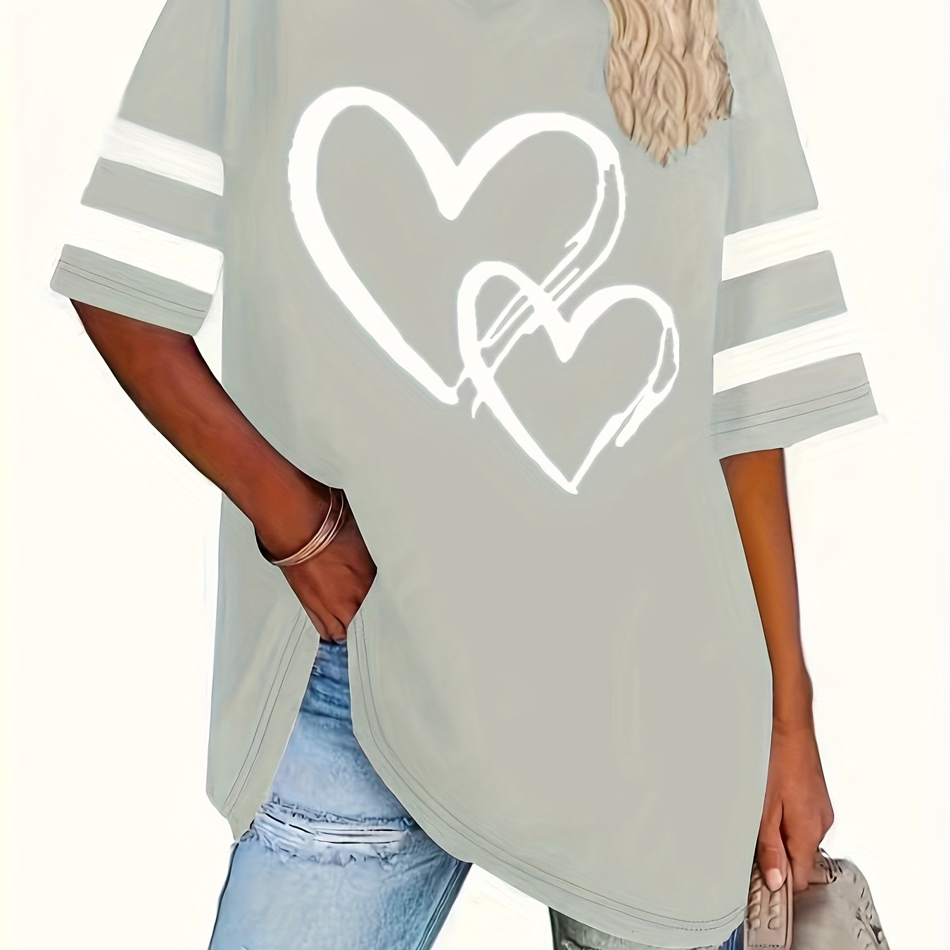 Plus-size heart-print V-neck tee with casual style and slight stretch fabric.