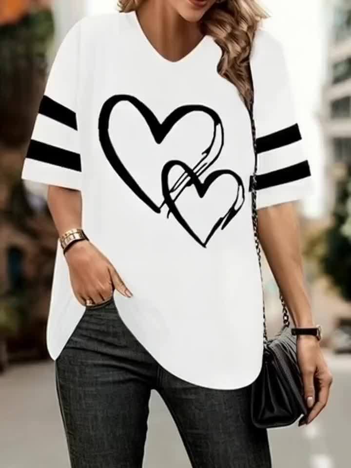 Plus-size heart-print V-neck tee with black stripes and hearts, casual style.