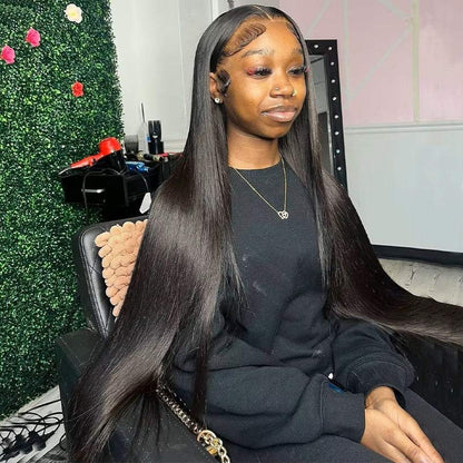 Swiss Lace Brazilian human hair wig on a person, showcasing long, sleek, straight hair with natural shine.
