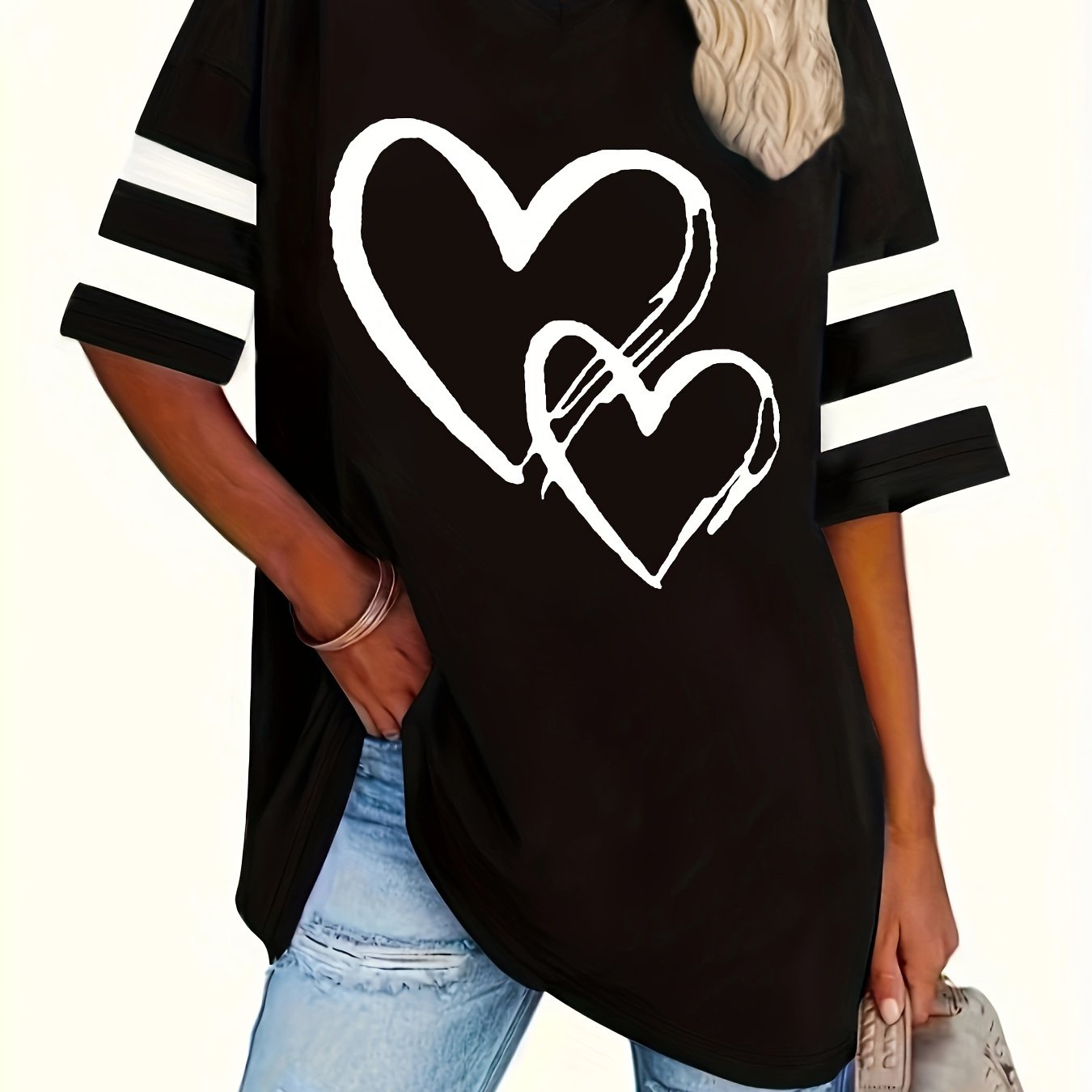 Plus-size heart-print V-neck tee with casual style and slight stretch fabric.