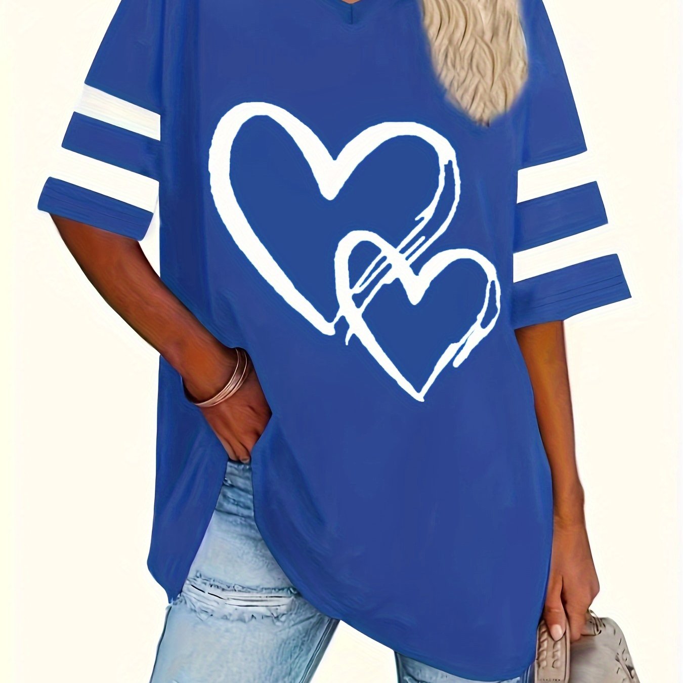 Plus-size heart-print V-neck tee in blue knit fabric, featuring a casual style with white heart design and slight stretch.