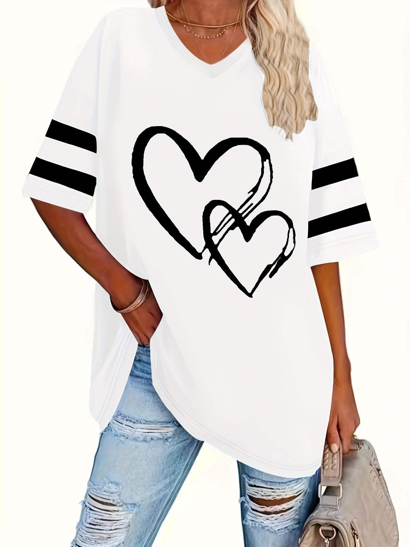 Plus-size heart-print V-neck tee with casual style and slight stretch fabric.