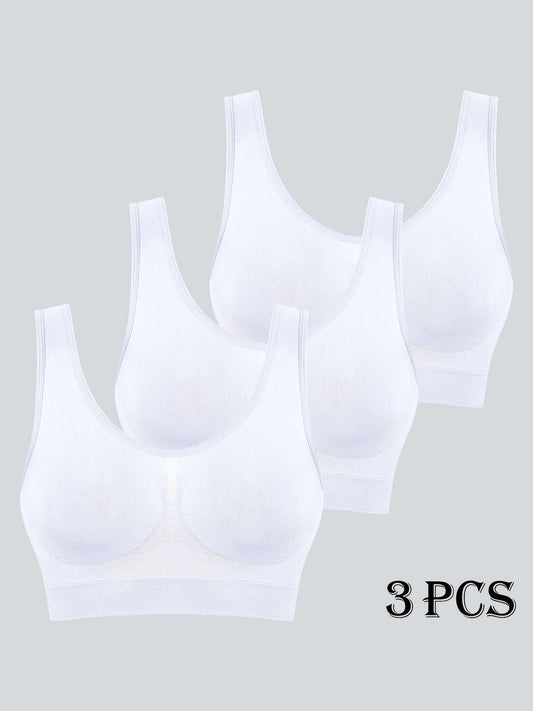 3-pack seamless sports bras in solid white, high support elastane knit.