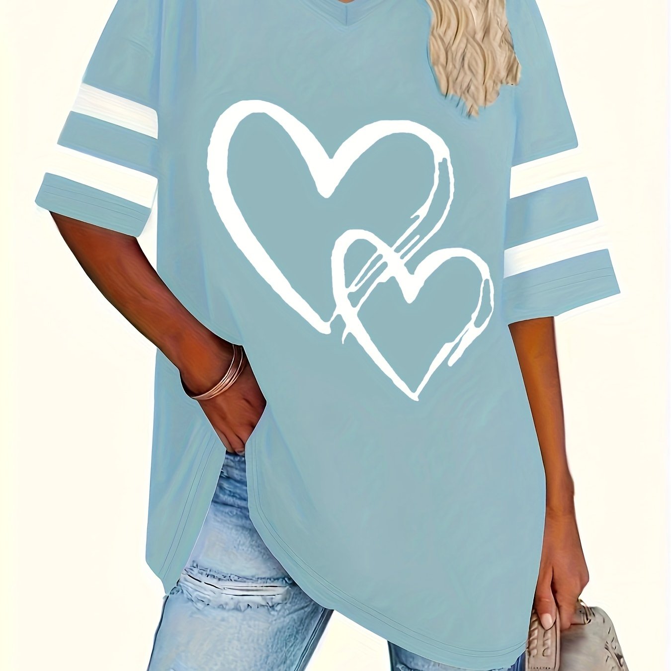 Plus-size heart-print V-neck tee with casual style and slight stretch fabric.